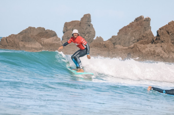 learn to surf Auckland